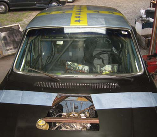 Illustration for article titled Black Metal V8olvo Now Equipped With Rebel Swedish Flag Roof